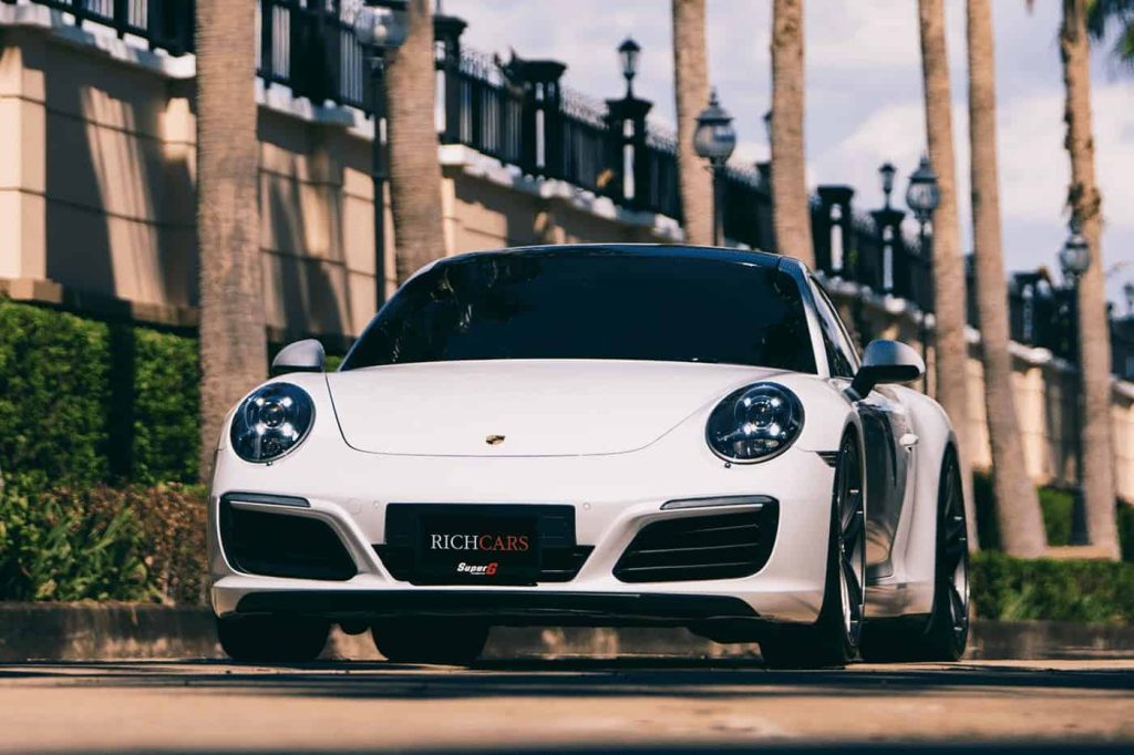 Starting at 34,900 Baht/1 Day

**Porsche Carrera 991 2018: A Symphony of Performance and Elegance**

Unleash the extraordinary with the Porsche Carrera 991 2018, a 2-door sports car that debuted in 2018, representing the pinnacle of the 7th generation Carrera lineup and the final model on the revered 991 platform before the introduction of the new 992 in 2020.

*Performance:*
- **Engine Options:**
- Carrera: 3.0L 6-cylinder turbocharged gasoline engine, 370 hp, 450 Nm torque.
- Carrera S: 3.0L 6-cylinder turbocharged gasoline engine, 420 hp, 500 Nm torque.
- Carrera GTS: 3.0L 6-cylinder turbocharged gasoline engine, 443 hp, 530 Nm torque.
- **Speed and Efficiency:**
- Top Speed: 295 km/h
- Fuel Consumption: 12.5 km/l

*Advanced Features:*
- Adjustable Air Suspension
- Carbon-Ceramic Brakes
- 7-Speed Automatic Transmission
- Intelligent All-Wheel-Drive System

*Global Acclaim:*
The 2018 Carrera 991 garnered widespread praise globally for its exceptional performance, cutting-edge technology, and captivating design. It was recognized as the best sports car in the world in 2018.

*Pros and Cons:*
**Pros:**
- Outstanding Performance
- Advanced Technology
- Elegant Design
- Comfortable
- Fuel-Efficient

**Cons:**
- High Price
- Limited Cargo Space
- Narrow Rear Seating

Porsche Carrera 991 2018 stands as an outstanding sports car, offering remarkable performance, advanced technology, and a beautiful design, making it an ideal choice for enthusiasts seeking a valuable sports car experience.