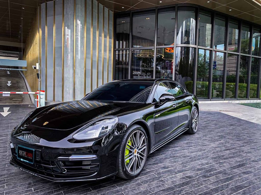 Starting at 32,900 Baht/1 Day

**Porsche Panamera 971: Exceptional Performance, Exquisite Design**

Embark on a thrilling journey with the Porsche Panamera 971, a sports sedan that debuted in 2016, representing the second generation of the Panamera series and the first to adopt the new MSB (Modularer Standardantriebs-Baukasten) platform by Porsche.

*Performance:*
- **Engine Options:** V6 and V8 gasoline engines available across three models.
- **Top Speed:** 289 km/h, 295 km/h, and 306 km/h for Panamera, Panamera 4S, and Panamera Turbo, respectively.
- **Acceleration:** 0 to 100 km/h in impressive times.
- **Fuel Efficiency:** Averaging between 12.8 to 13.8 km/l.

*Distinctive Features:*
- Adaptive Air Suspension
- Carbon Ceramic Brake System
- 8-Speed Automatic Transmission
- Intelligent AWD System

*Luxurious Interior:*
- Multiple Adjustment Levels for Ride Height
- Carbon Ceramic Brakes for Superior Short-distance Stopping
- 8-speed Automatic Transmission with Adaptive Shift Strategy
- Smart AWD System for Power Distribution

*Price:*
Acknowledged globally for its outstanding performance, cutting-edge technology, and breathtaking design, the Porsche Panamera 971 received accolades as the best sports sedan in 2016.

*Pros and Cons:*
*Pros:*
- Exceptional Performance
- Cutting-edge Technology
- Striking Design
- Comfortable Interior
- Fuel Efficiency

*Cons:*
- High Price
- Limited Cargo Space
- Relatively Narrow Rear Seating

In summary, the Porsche Panamera 971 is a remarkable sports sedan, offering exceptional performance, advanced technology, and elegant design, making it an ideal choice for enthusiasts seeking a sports sedan that justifies its price.